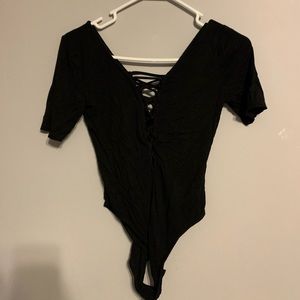 Black v-cut body suit